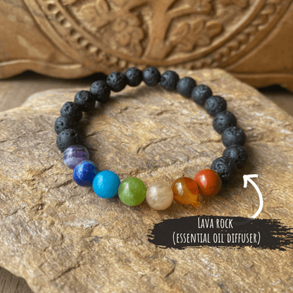 natural gemstone 7 chakra beaded bracelet made of protective lava rock stone showing a stone like texture, also used as an essential oil diffuser