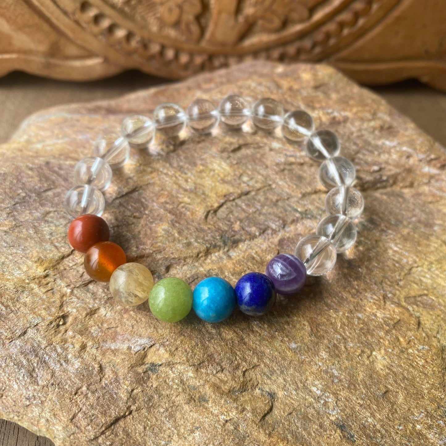 natural smooth gemstone quartz 7 chakra rainbow bracelet with half the bracelet quartz and the other half 7 beads making a rainbow 