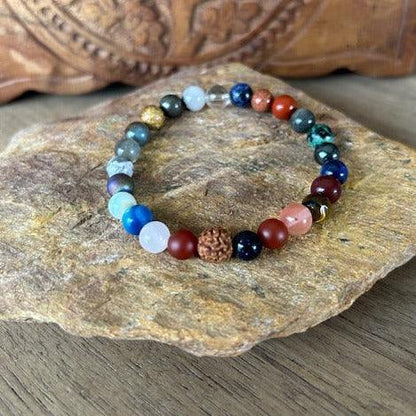 natural gemstone beaded bracelet featuring an essential oil diffuser rudraksha seed and multiple colors